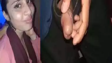 Shy girlfriend sucking dick of lover through pant zip open