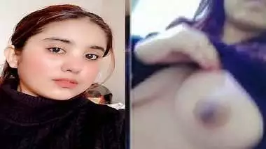 Beautiful girl lifting dress and showing big boobs