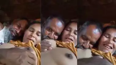 An old man enjoys the boob sucking of a desi lady